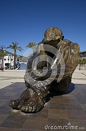 11M memory memorial iron man sculpture in Cartagena Spain in port promenade Editorial Stock Photo