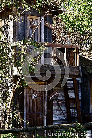 Ma & Pa two story outdoor outhouse Stock Photo