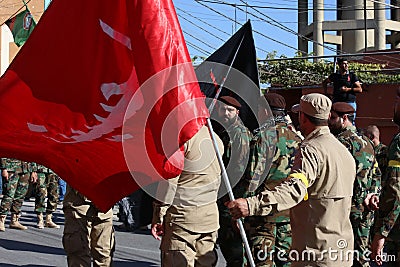 Flags bearing religious rituals during Funeral anthracites Military commander in Hezbollah who was killed in Syria war Editorial Stock Photo