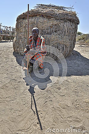 Masai man in front of the village house, Tanzania Editorial Stock Photo