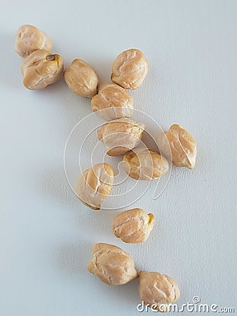 The macadamia nuts in white background. Stock Photo