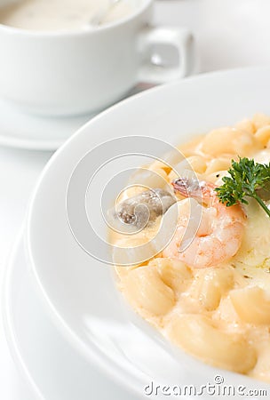 Macaroni pasta prawns carbonara Stock Photo