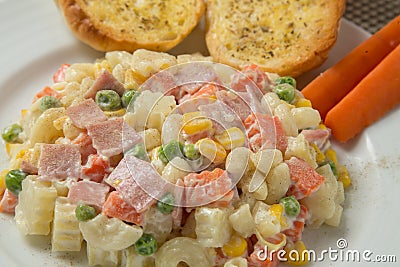 Macaroni salad with mayonnaise Stock Photo