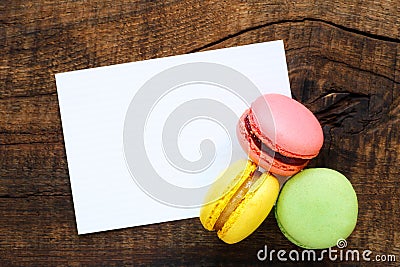 Macaroons with greeting card Stock Photo