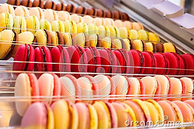 Macaroons on showcase Stock Photo