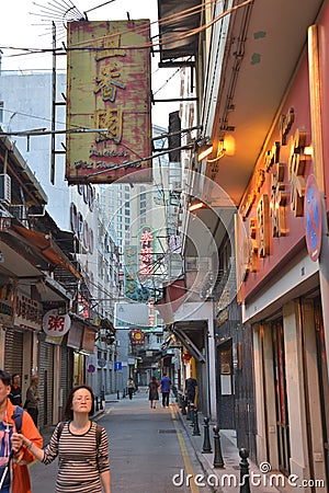 Macau quaint shops tall building street view Editorial Stock Photo