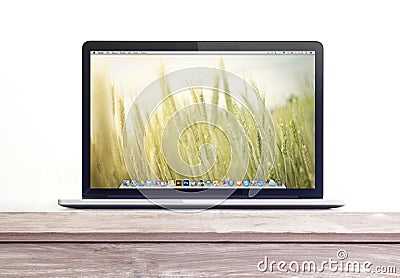 Macbook pro retina on the desk Editorial Stock Photo