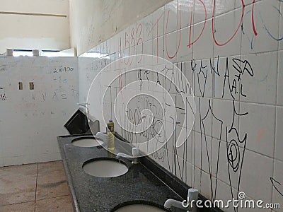 MaceiÃ³, Brazil - 01 september 2019: Public school bathroom in Brazil with vandalism Editorial Stock Photo