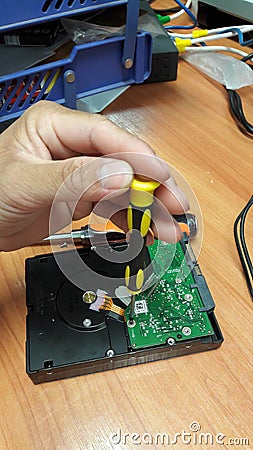 Machanic to repaire hard disk Stock Photo