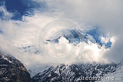 Machapuchare, Machhapuchchhre or Machhapuchhre Fish Tail Mountain Peak Cloudscape Nepal Himalayas Landscape Stock Photo