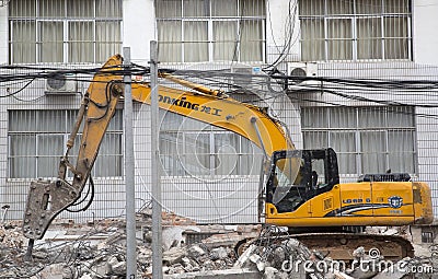 Machine demolition buildings Editorial Stock Photo