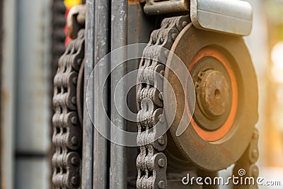 Machine engine chain with cog wheel part of forklift truck Stock Photo