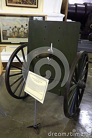 Machine gun of the Maxim system, model 1889. on a carriage-type machine in the museum hall. St. Petersburg Editorial Stock Photo