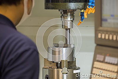 The machine operator working with CNC milling machine Stock Photo