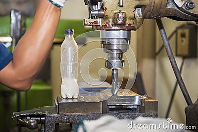 The machine operator working t NC milling machine Stock Photo