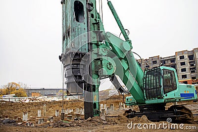 Machine for the piling works at a construction site Stock Photo