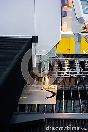 Machine for plasma cutting of metal. Precision metal cutting. Making a New Year`s deer from metal Stock Photo