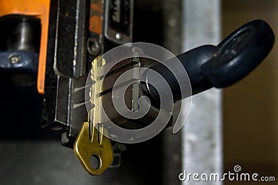 Machine production of duplicate metal key. Stock Photo