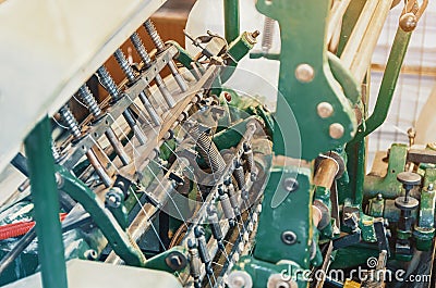 Machine for stitching sheets of paper in the printing. Magazine, brochure, book. Production of printed products. Vintage Stock Photo