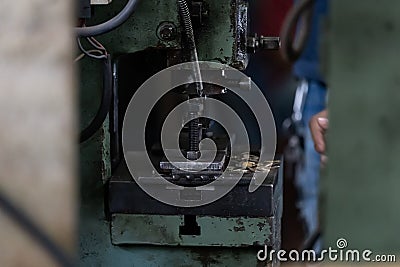 Machine and tool of Computer numerical control CNC, factory creates metal religion art such as Gold rolling machine and little Stock Photo