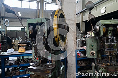 Machine and tool of Computer numerical control CNC, factory creates metal religion art such as Gold rolling machine and little Stock Photo
