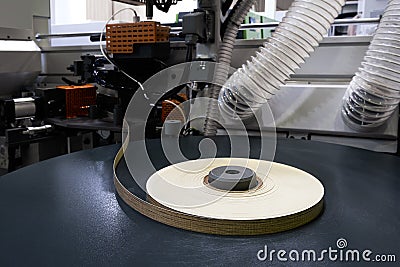 Machine tools for gluing edging onto furniture wood board Stock Photo