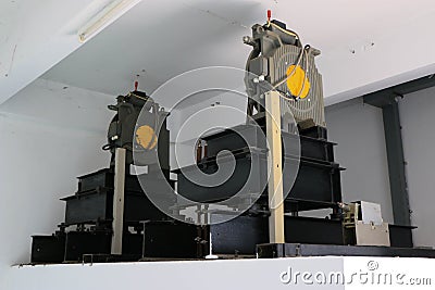 Machine on the upper part of a small elevator Stock Photo