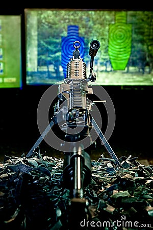 Machinegun against a shooting mark Stock Photo