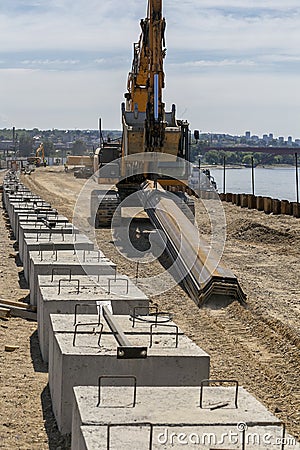 Machinery on revetment construction site Stock Photo