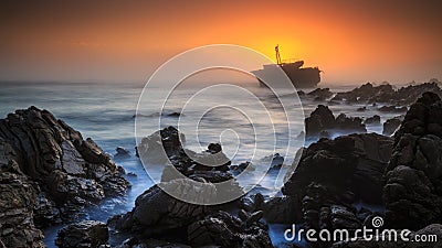 Machu Maru shipwreck Sunset Stock Photo