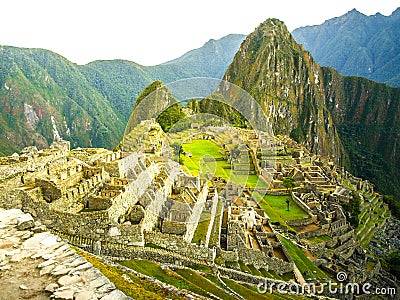 Machu Picchu - lost city of Incas. Historical citadel above Sacred Valley with Urubamba River in Peru Stock Photo