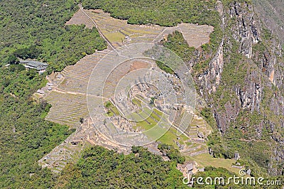 Machu picchu old mountain, pre columbian inca site situated on a mountain ridge above the urubamba valley in Peru Stock Photo