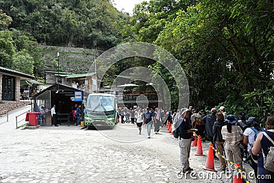 Queue of tourists wating for the bus at the top of Machu Picchu. Machu Picchu, Peru, October 6, 2023. Editorial Stock Photo