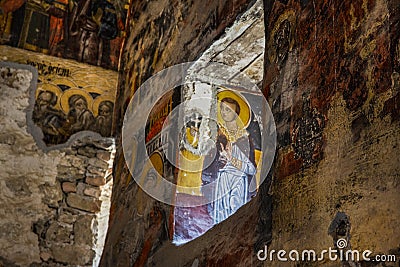Macka, Trabzon, Turkey - August 3, 2014; Sumela monastery courtyard under the rock. Remains of old fresco are seen on several Editorial Stock Photo
