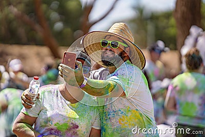 Participant In Outdoors Charity Color Fun Run Editorial Stock Photo