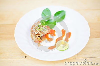 Mackerel in tomato sauce with Thai dressed salad Stock Photo
