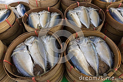 Mackerels in wood basket Stock Photo