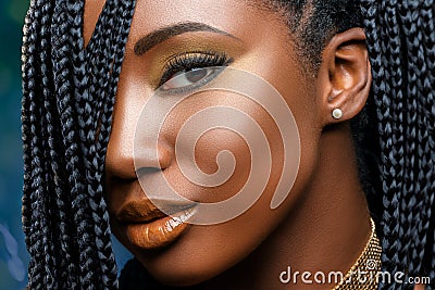 Macro beauty face shot of african girl with braids. Stock Photo