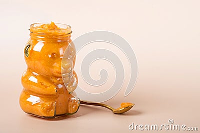 Macro carrot baby food on spoon Stock Photo