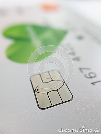 Macro close up of bank card electronic microcircuit contacts Stock Photo