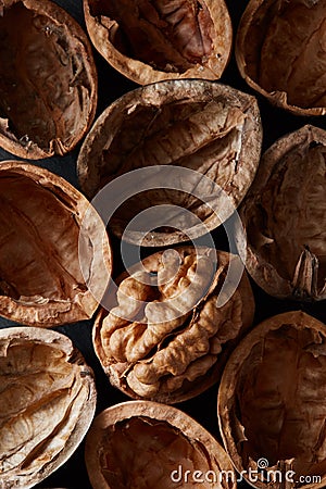 Macro close-up crop of walnuts shells as food backdrop composition Stock Photo