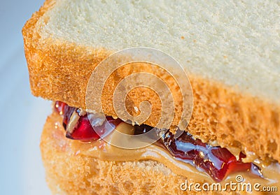 Macro close up of peanut butter jelly sandwich Stock Photo