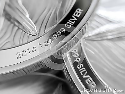 Macro close up of pure Silver Bullion coins Stock Photo