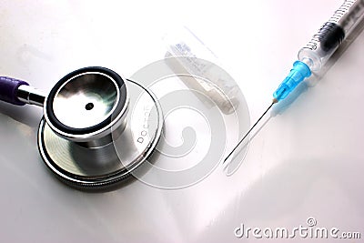 Macro close-up of a stethoscope tablet on a background of packing a medical gown Stock Photo