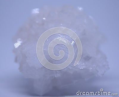 A macro close up view of calcium chloride crystal isolated on white Stock Photo