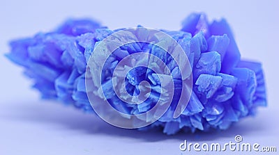 A macro close up view of copper sulphate crystal isolated on white Stock Photo