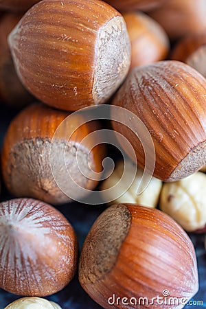 Macro close-up of whole and peeled hazelnuts Stock Photo