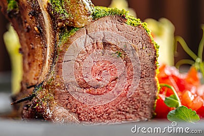 Closeup on medium well cooked rack of lamb cutlet Stock Photo