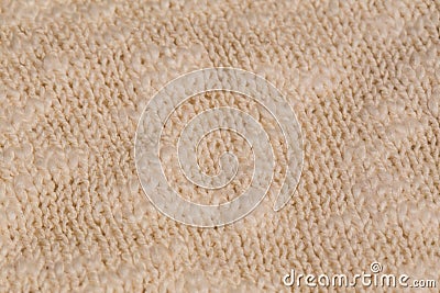 Macro color image of beige knitted texture. Stock Photo