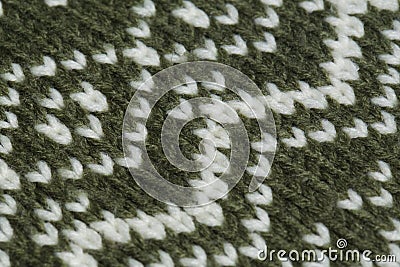 Macro color image of green and white knitted texture. Stock Photo